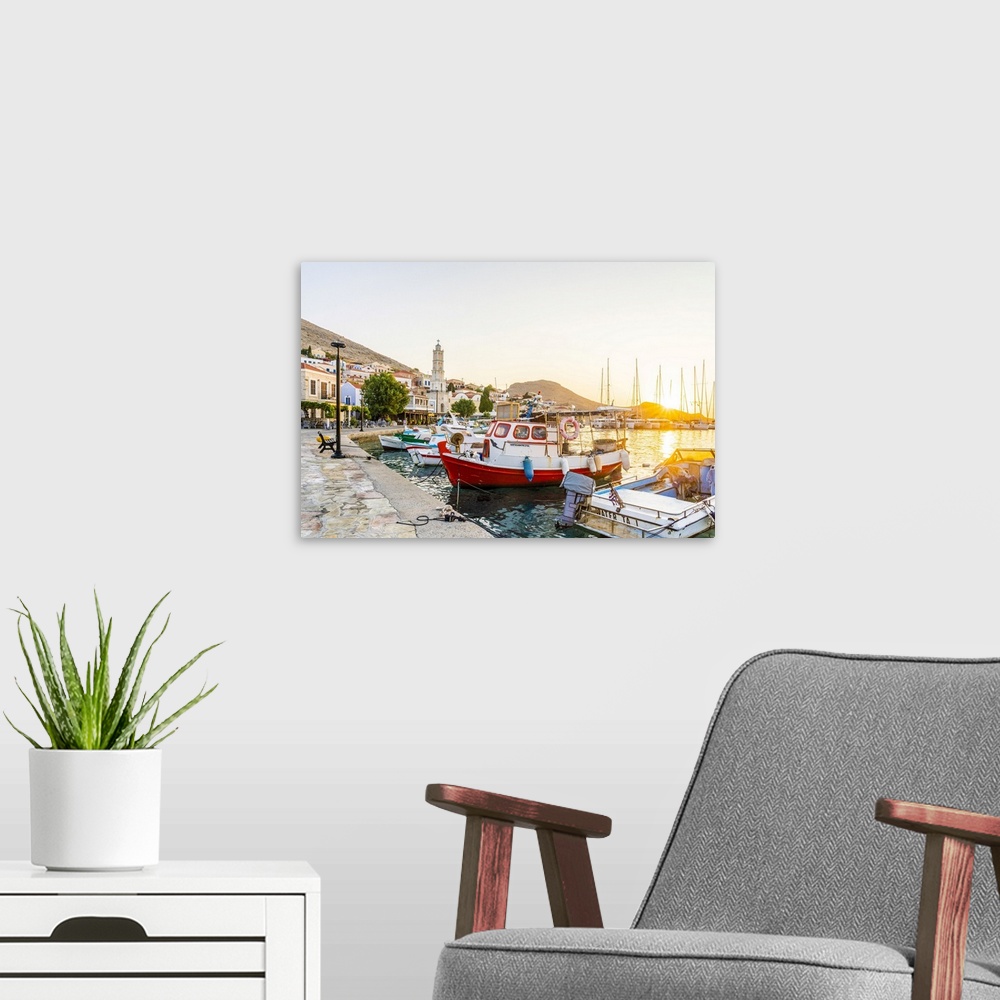 A modern room featuring The Colorful Harbor At Sunrise, In Halki, Chalki, Dodecanese Islands, Greece