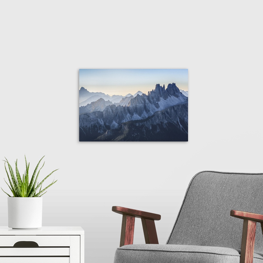 A modern room featuring the jagged ridge of the Croda da Lago, group Pelmo Croda da Lago, Dolomites, Belluno, Italy.