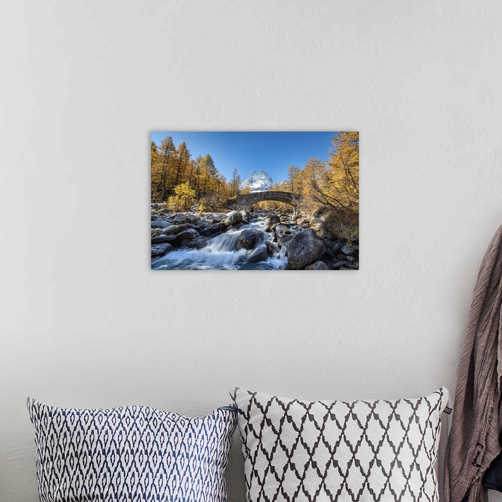 A bohemian room featuring The river Cairasca and Monte Leone in the background during autumn, Alpe Veglia, Val Cairasca val...