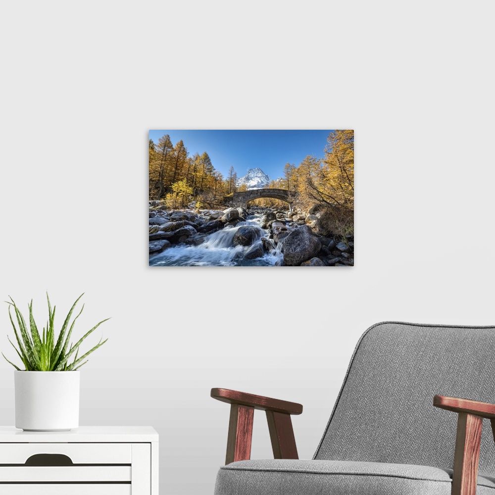 A modern room featuring The river Cairasca and Monte Leone in the background during autumn, Alpe Veglia, Val Cairasca val...