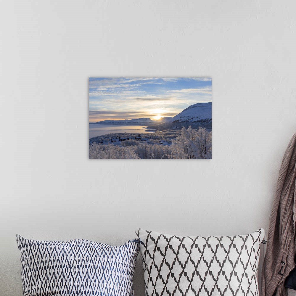 A bohemian room featuring The sun rise over Lapland Door. Bjorkliden, Norbottens Ian, Sweden,Europe
