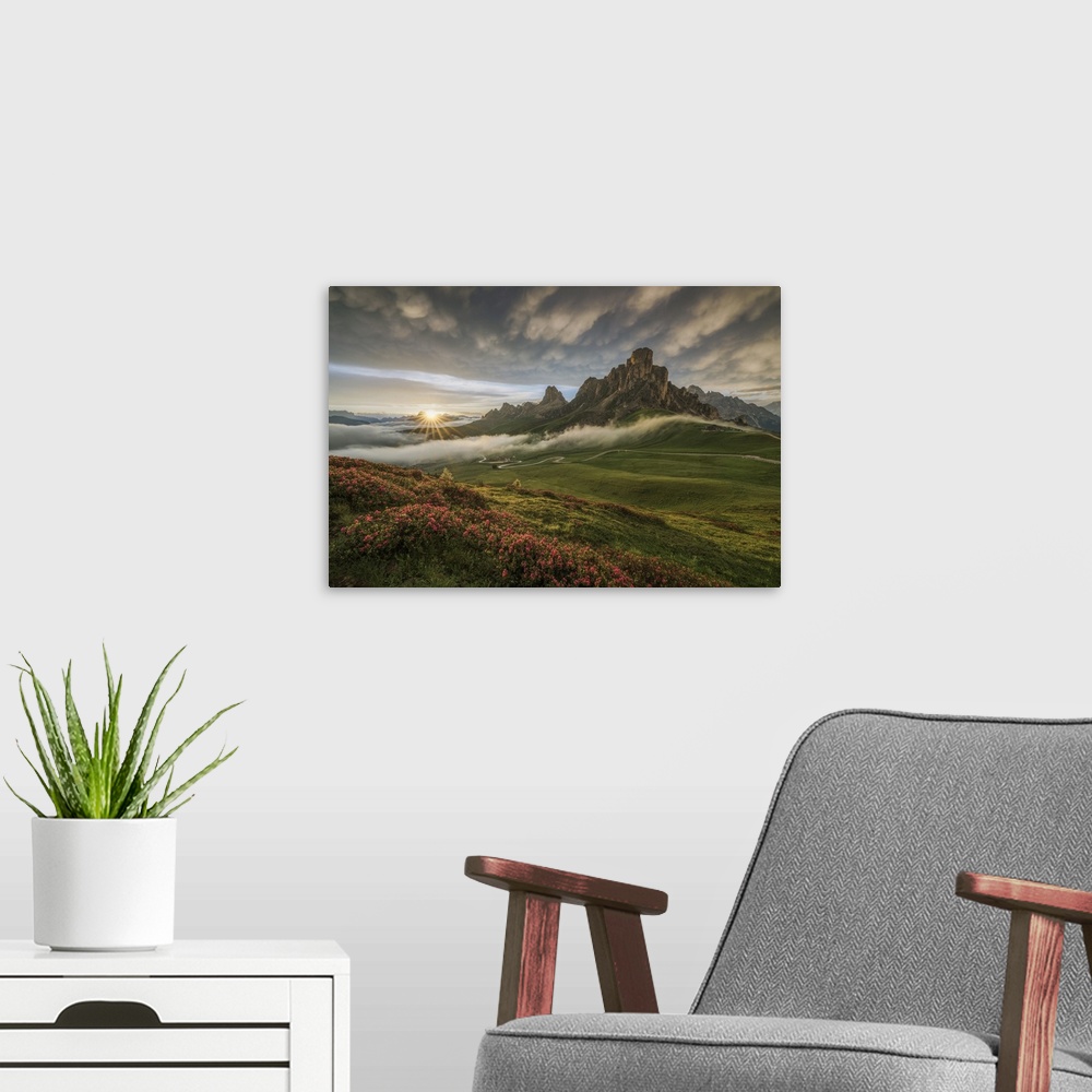 A modern room featuring The sunset in front of Ra Gusela, Averau, Nuvolau and Passo Giau in Dolomiti Bellunesi, Unesco He...