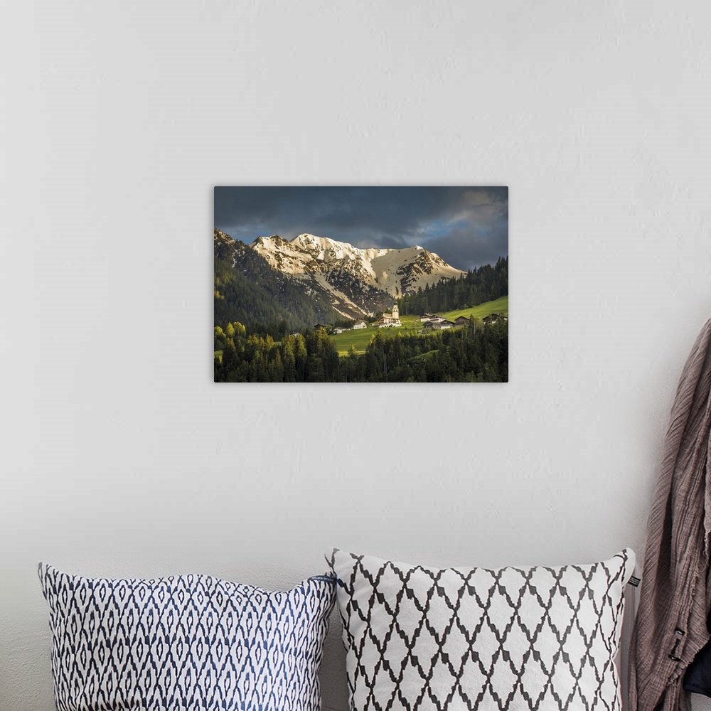 A bohemian room featuring The village of Hollbruck above the Pustertal, East Tyrol, Tyrol, Austria