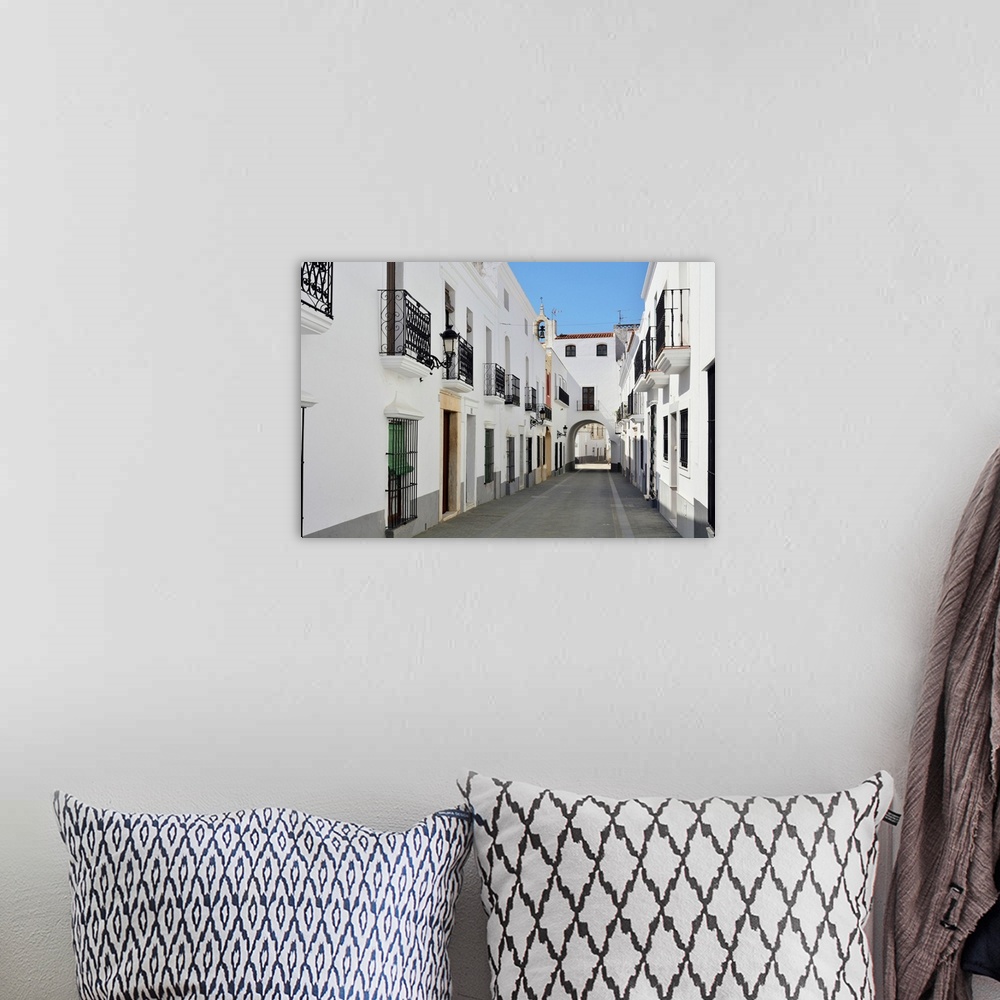 A bohemian room featuring The white washed houses of Olivenza. Extremadura, Spain.