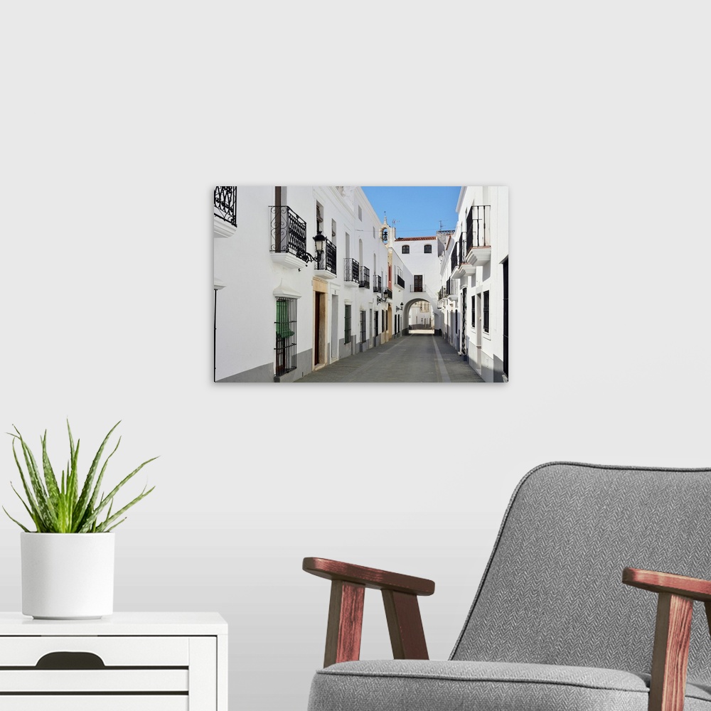 A modern room featuring The white washed houses of Olivenza. Extremadura, Spain.