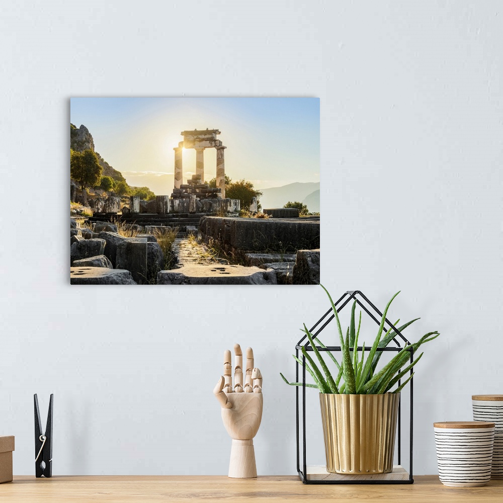 A bohemian room featuring Tholos of Delphi, Temple of Athena Pronaia, sunrise, Delphi, Phocis, Greece