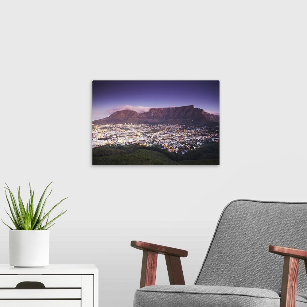 A modern room featuring Table Mountain at dusk, Cape Town, Western Cape, South Africa