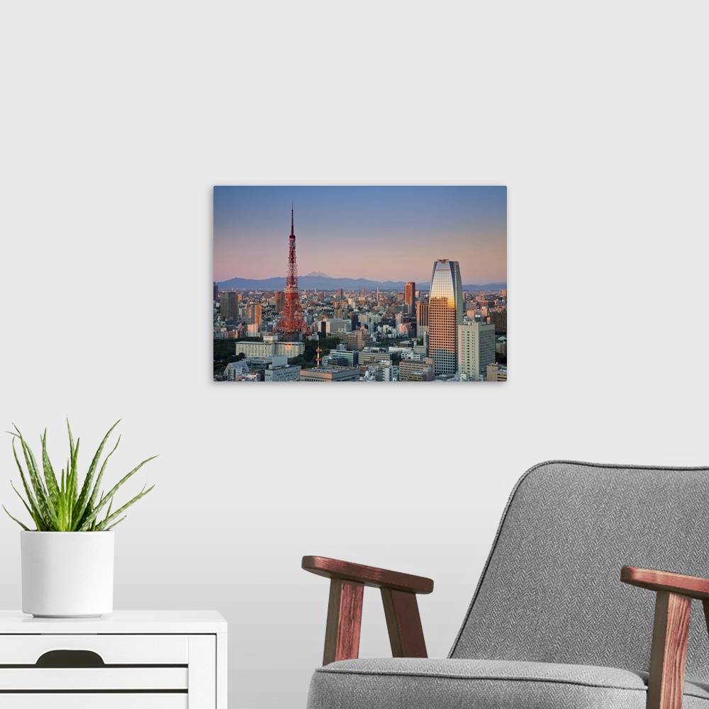 A modern room featuring Tokyo Tower and Mt. Fuji from Shiodome, Tokyo, Japan