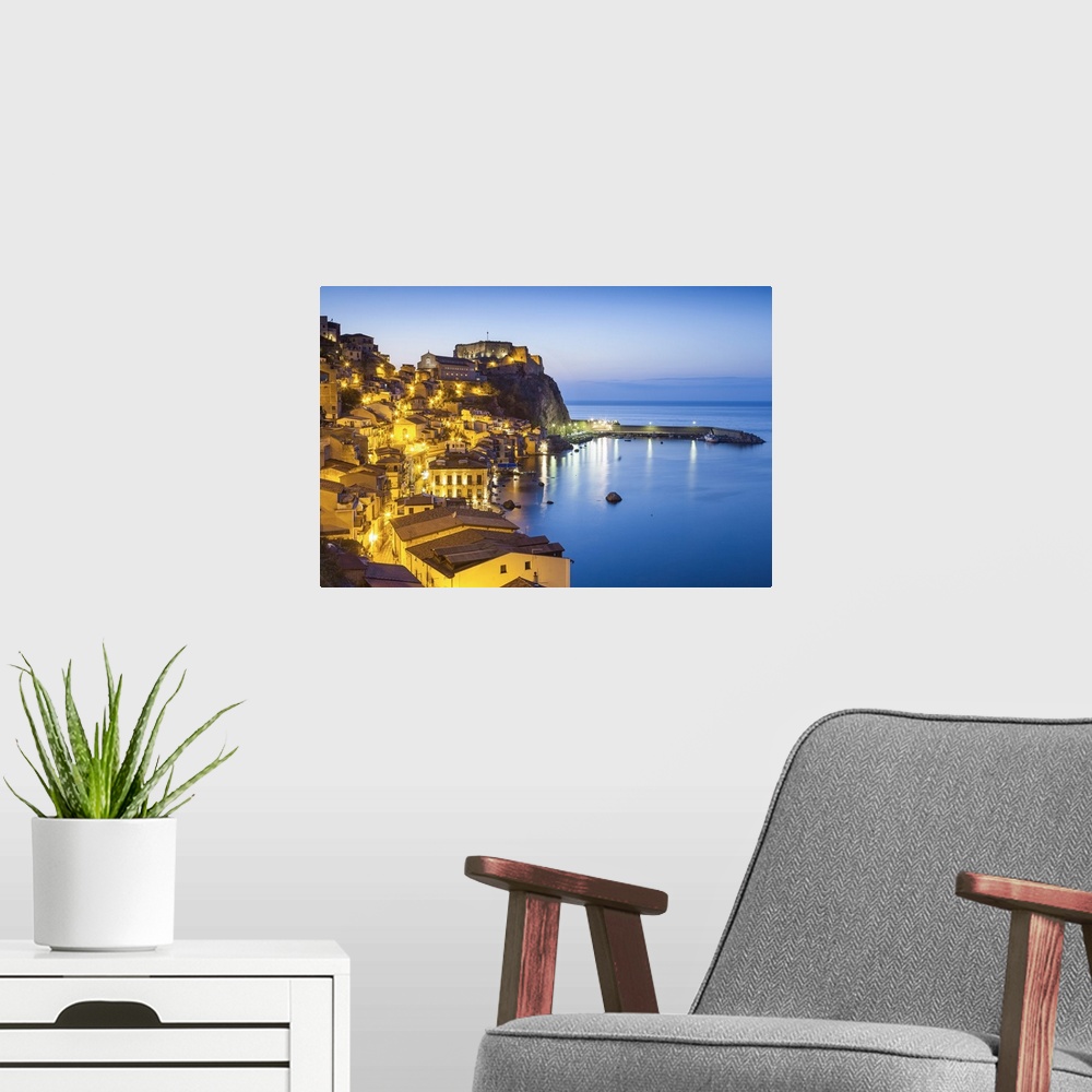 A modern room featuring Town View at dusk, with Castello Ruffo, Scilla, Calabria, Italy