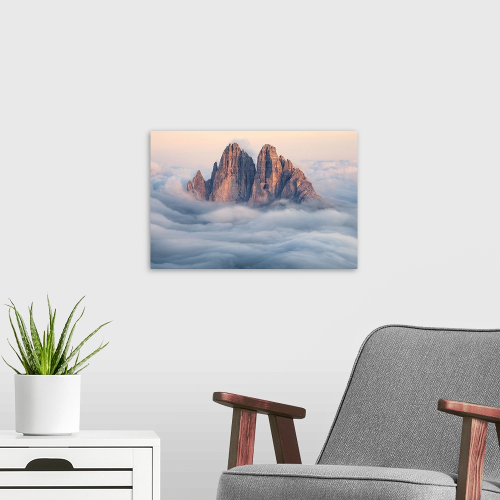 A modern room featuring Tre Cime di Lavaredo emerging from the clouds, Sexten Dolomites, South Tyrol, Bolzano, Italy, Europe