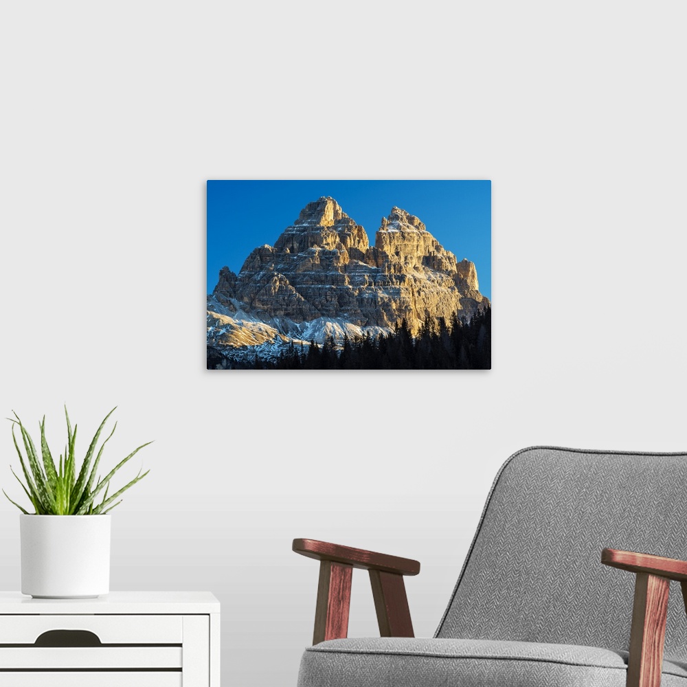 A modern room featuring Sunrise view over Tre Cime di Lavaredo or Drei Zinnen mountain peaks in the Dolomites, Veneto, Italy