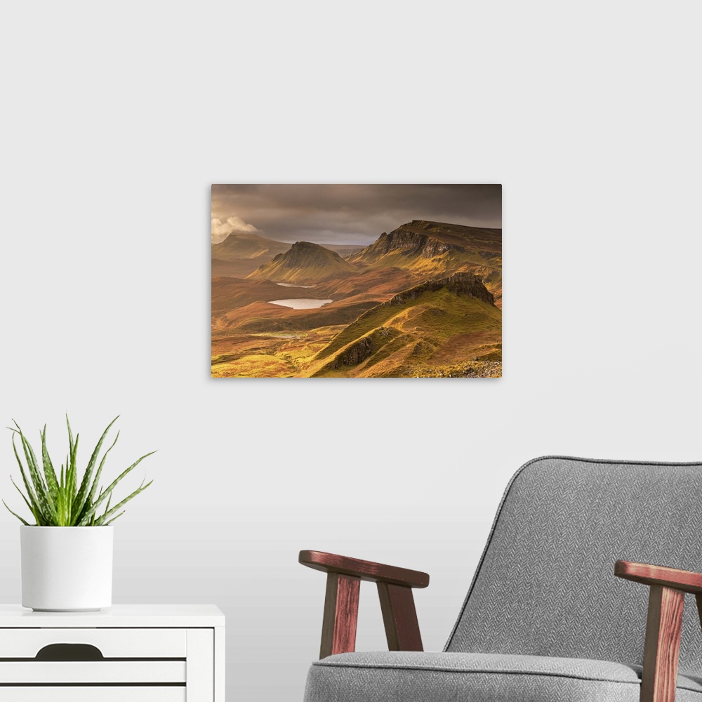 A modern room featuring Dramatic light over the Trotternish mountain ridge from the Quiraing, Isle of Skye, Scotland.