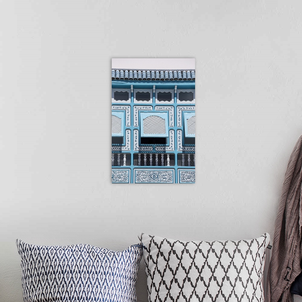 A bohemian room featuring Tunisia, Kairouan, Madina, decorative blue window, decorative.