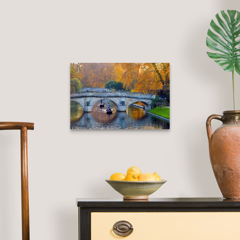 A traditional room featuring UK, England, Cambridge, The Backs, Clare and King's College Bridges over River Cam in Autumn