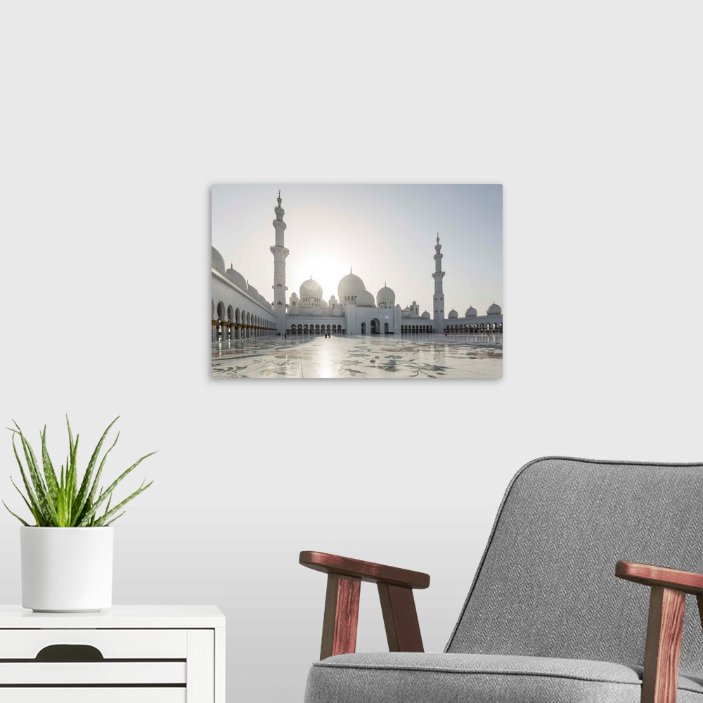A modern room featuring United Arab Emirates, Abu Dhabi. Sheikh Zayed Grand Mosque at sunset