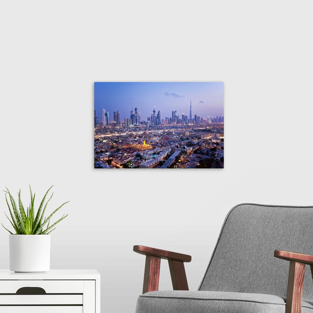 A modern room featuring United Arab Emirates, Dubai, elevated view of the new Dubai skyline of modern architecture and sk...