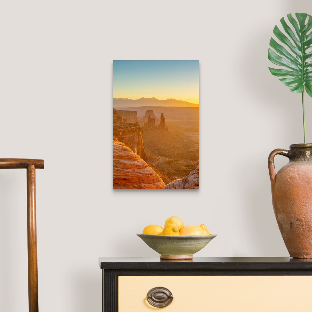 A traditional room featuring USA, Utah, Canyonlands National Park, Island in the Sky District, view from Mesa Arch, Sunrise.