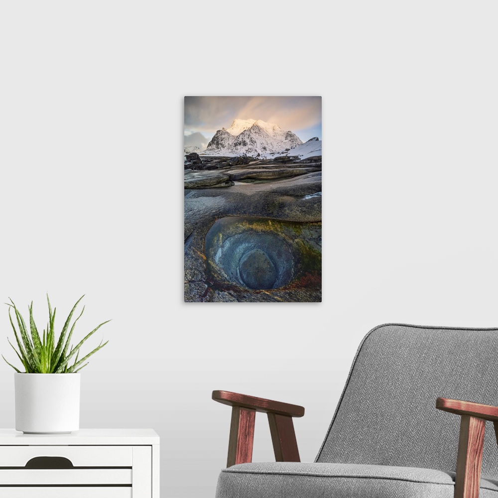 A modern room featuring Uttakleiv beach with a famous eye of dragon in foreground, Vestvagoy, Lofoten island, Norway.