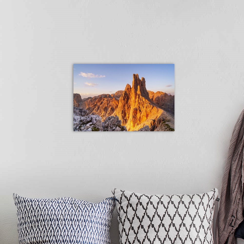 A bohemian room featuring Vajolet towers at sunset in Catinaccio group of Dolomites. Re Alberto refuge in Catinaccio group....
