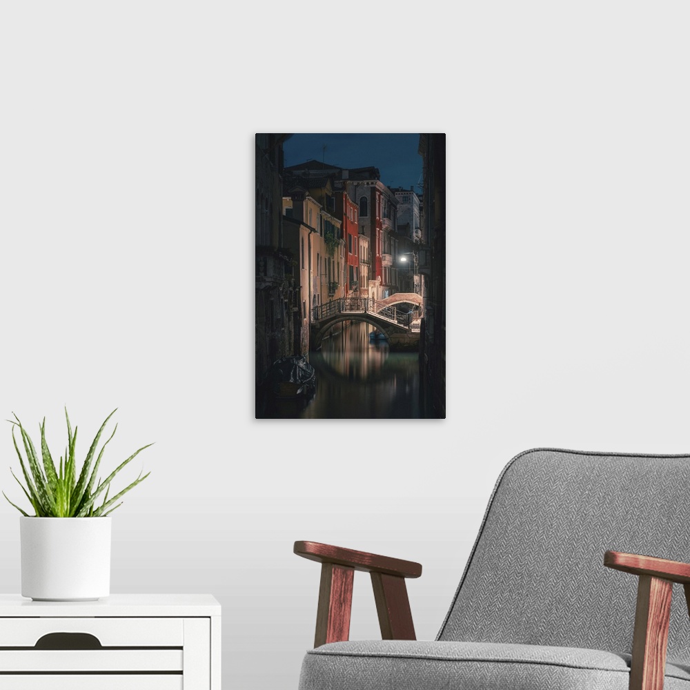 A modern room featuring Venice, Veneto, Italy, Backstreet canals in Castello at night.