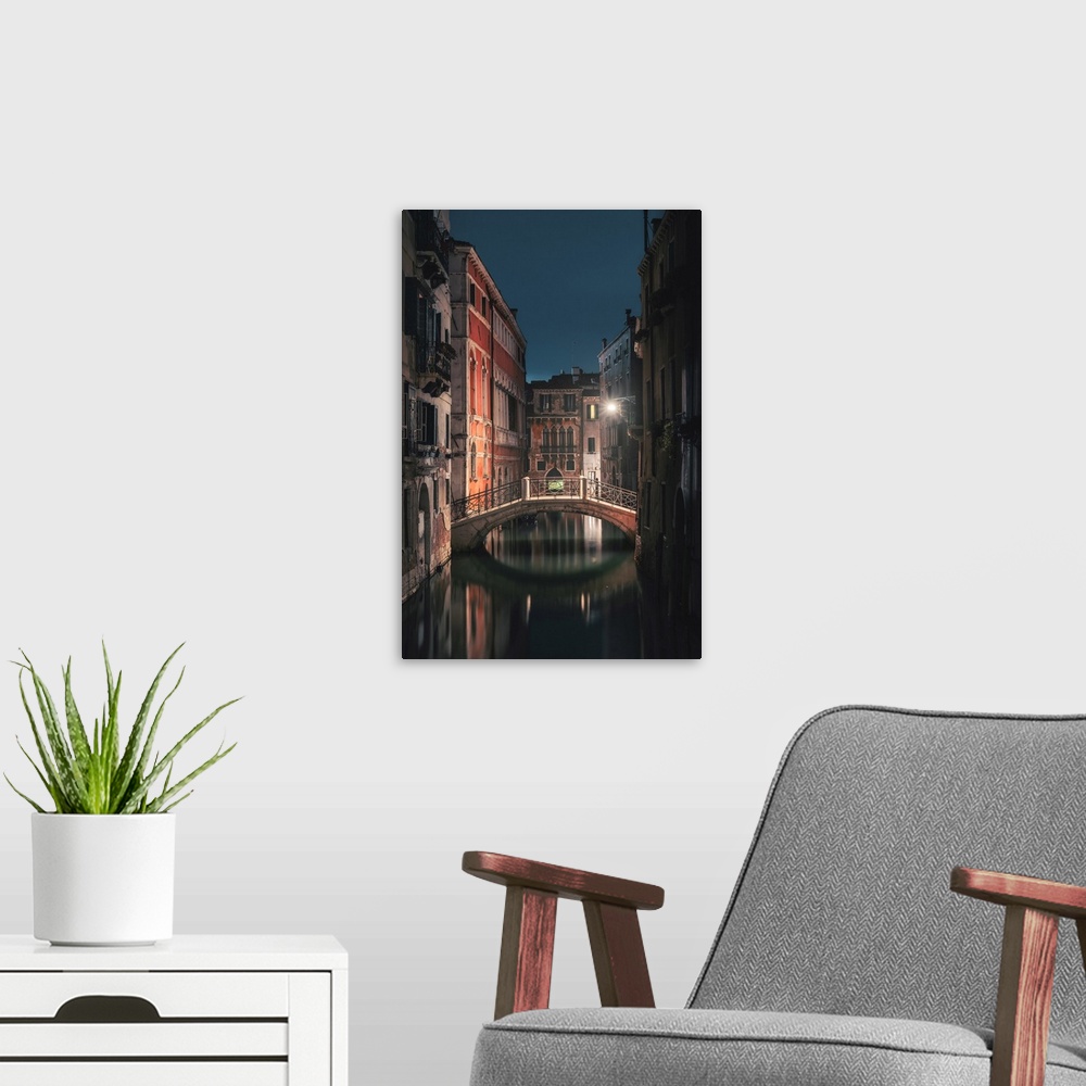 A modern room featuring Venice, Veneto, Italy, Backstreet canals in San Marco at night.