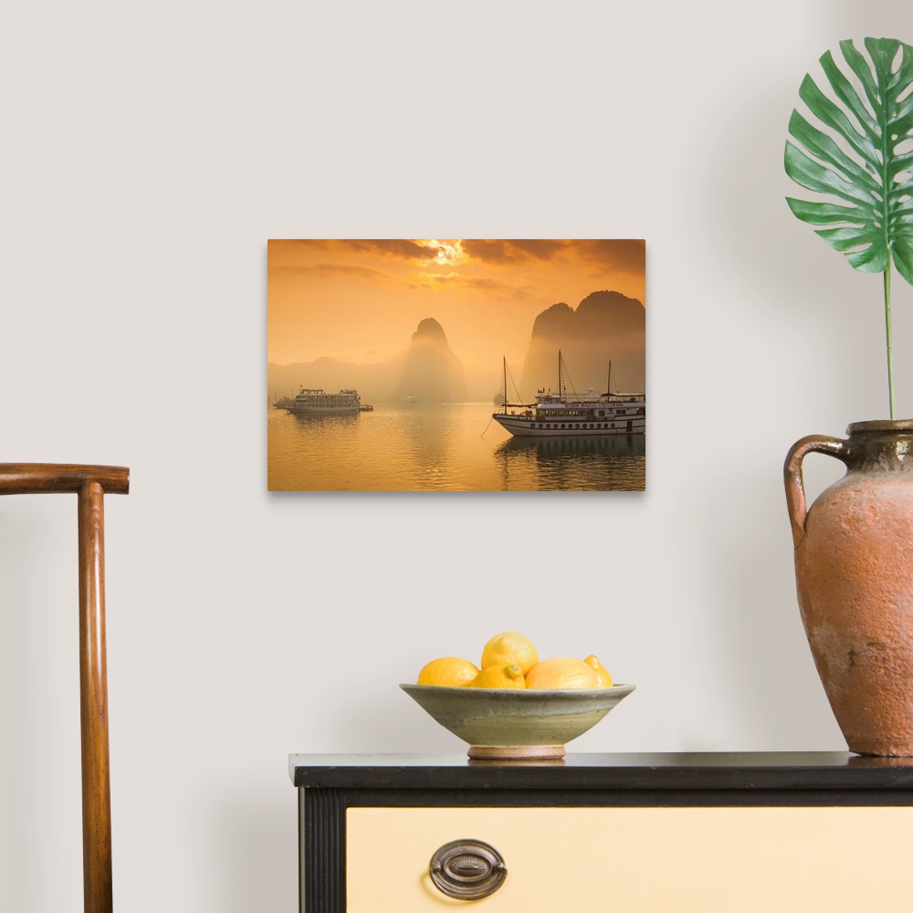 A traditional room featuring Vietnam, Halong Bay, tourist boats, sunrise.
