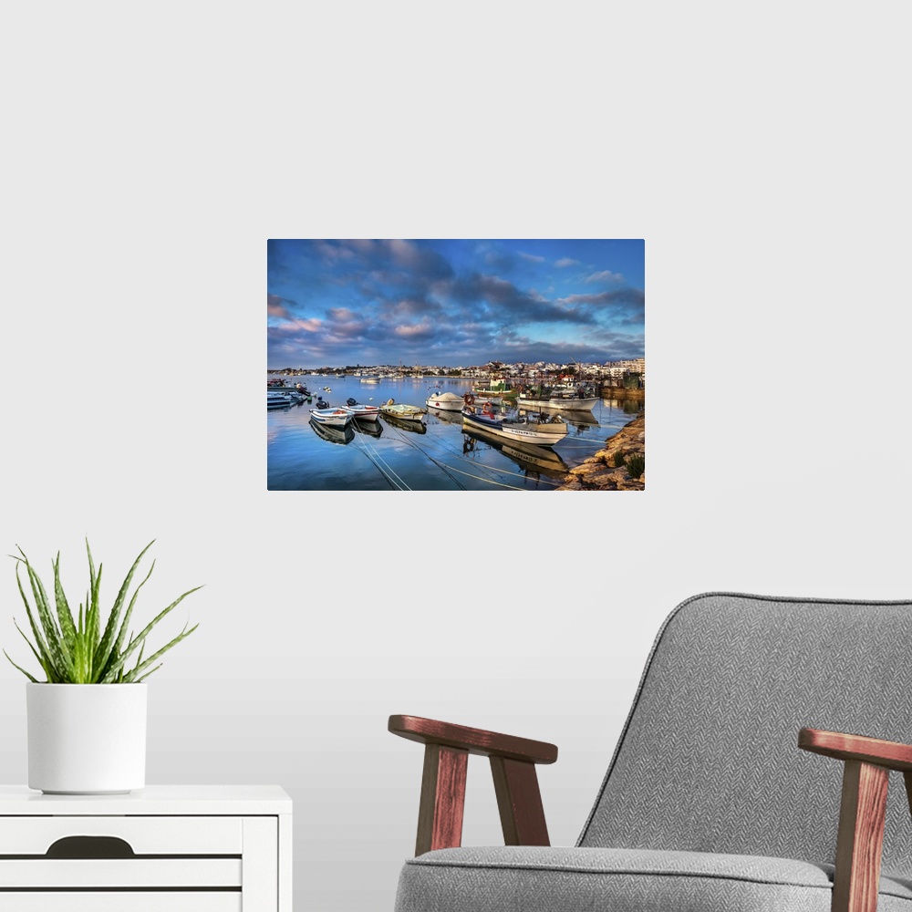 A modern room featuring View from fishing harbour towards old town, Lagos, Algarve, Portugal