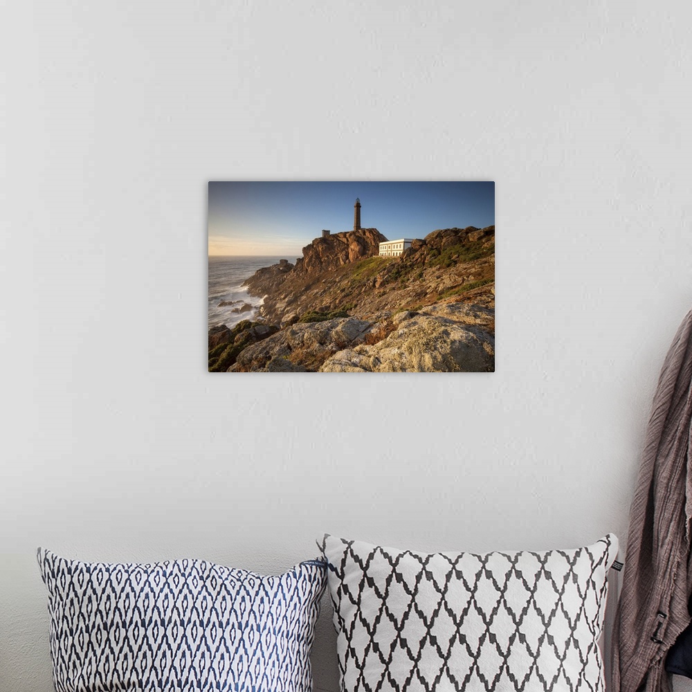 A bohemian room featuring Cabo Vilan, Camarinas, A Coruna district, Galicia, Spain, Europe. View of Cabo Vilan lighthouse