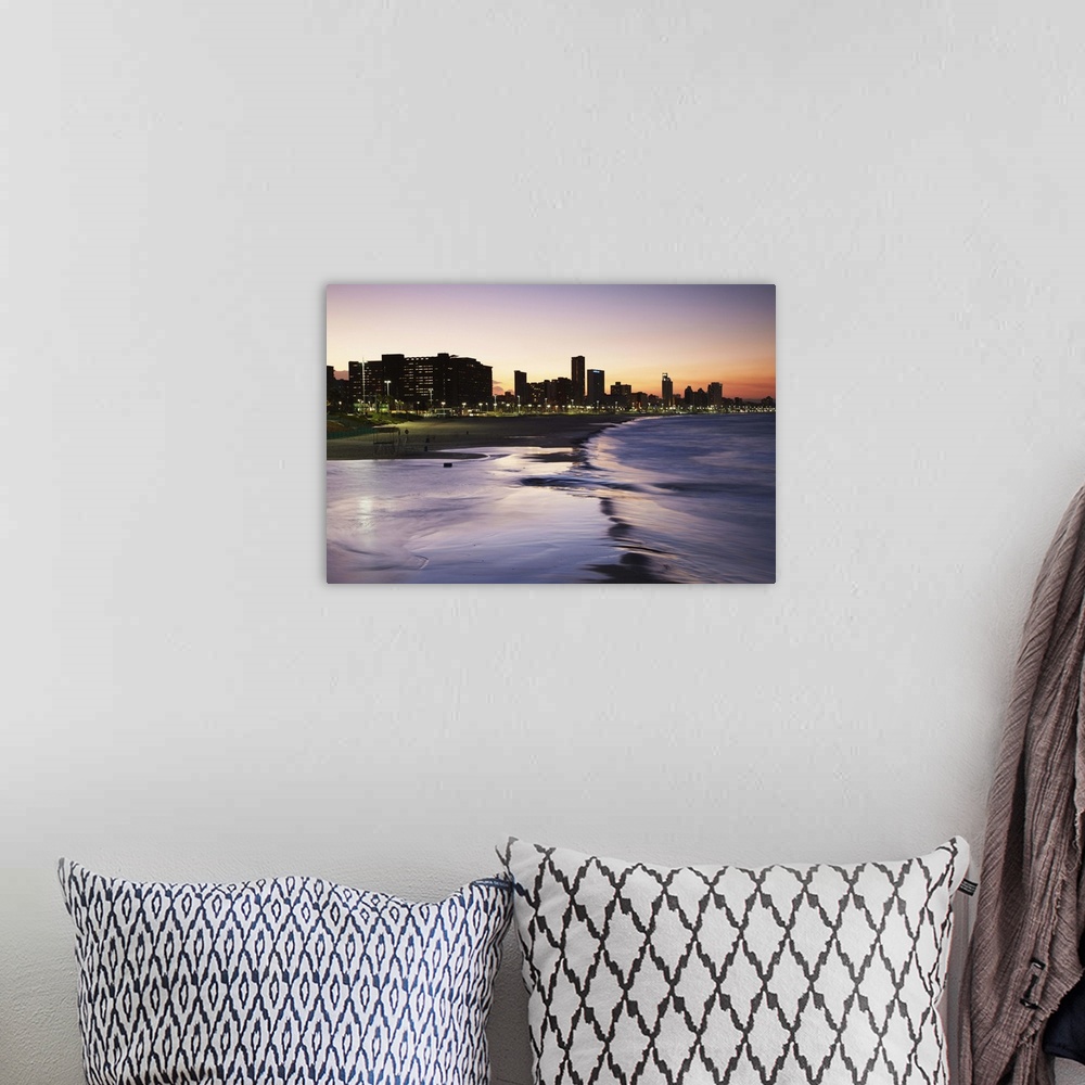 A bohemian room featuring View of city skyline and beachfront at sunset, Durban, KwaZulu-Natal, South Africa