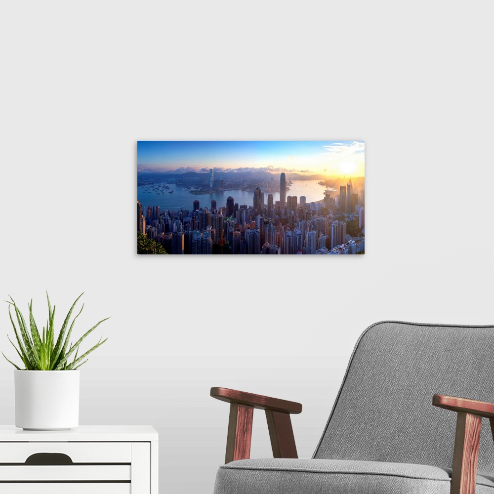 A modern room featuring View of Hong Kong Island skyline at dawn, Hong Kong, China.