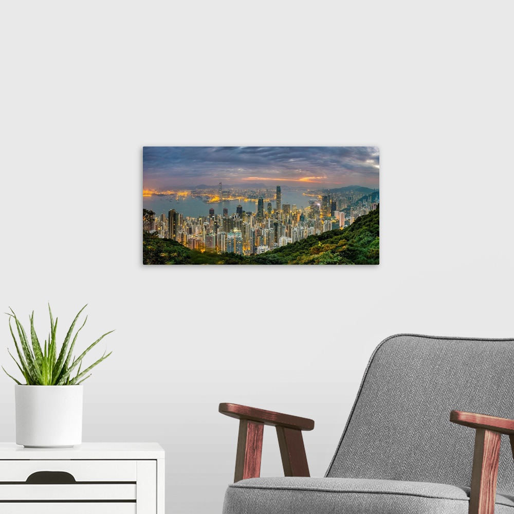 A modern room featuring Panoramic view of Hong Kong skyline at dawn from Lugard Road on Victoria Peak, Hong Kong Island, ...