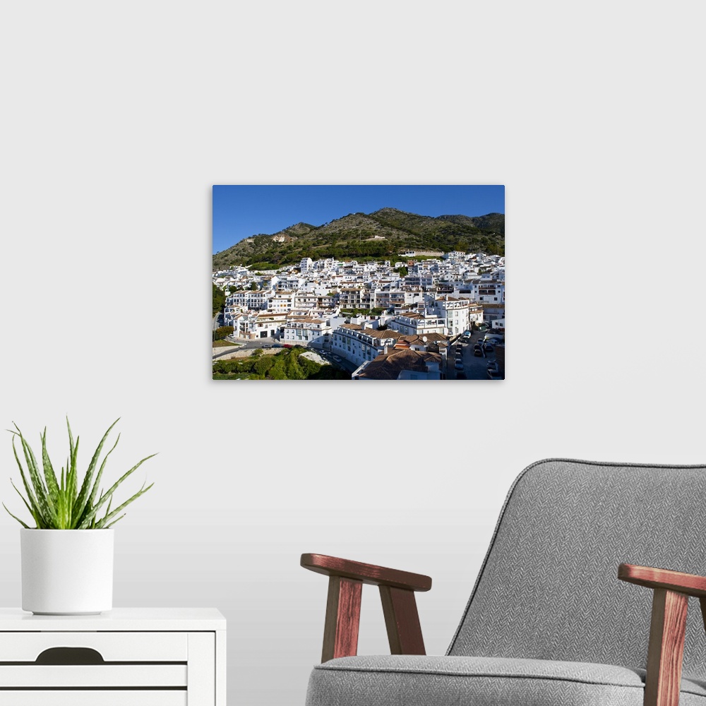 A modern room featuring View of Mijas, white town in Costa del Sol, Andalusia, Spain.