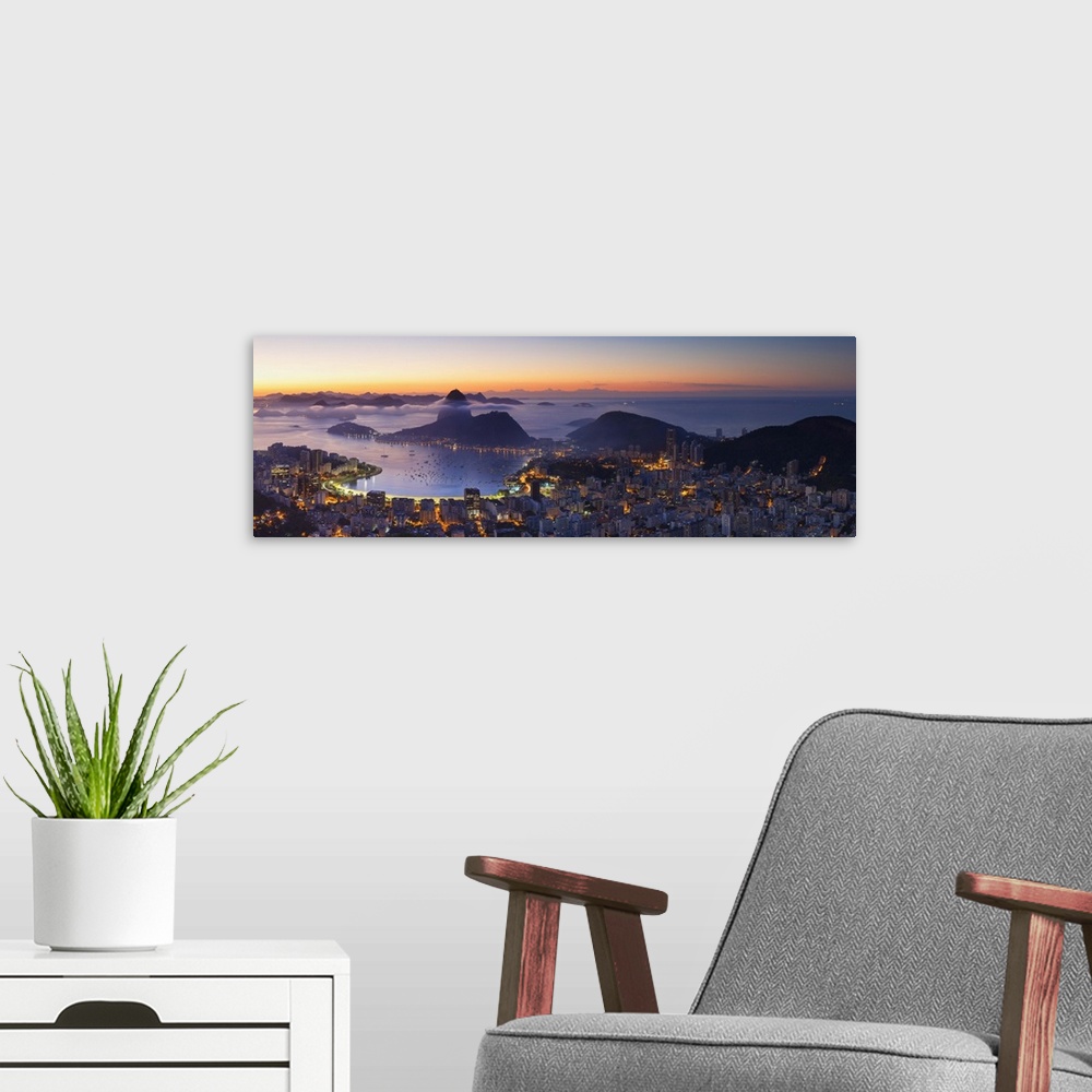A modern room featuring View of Sugarloaf Mountain and Botafogo Bay at dawn, Rio de Janeiro, Brazil