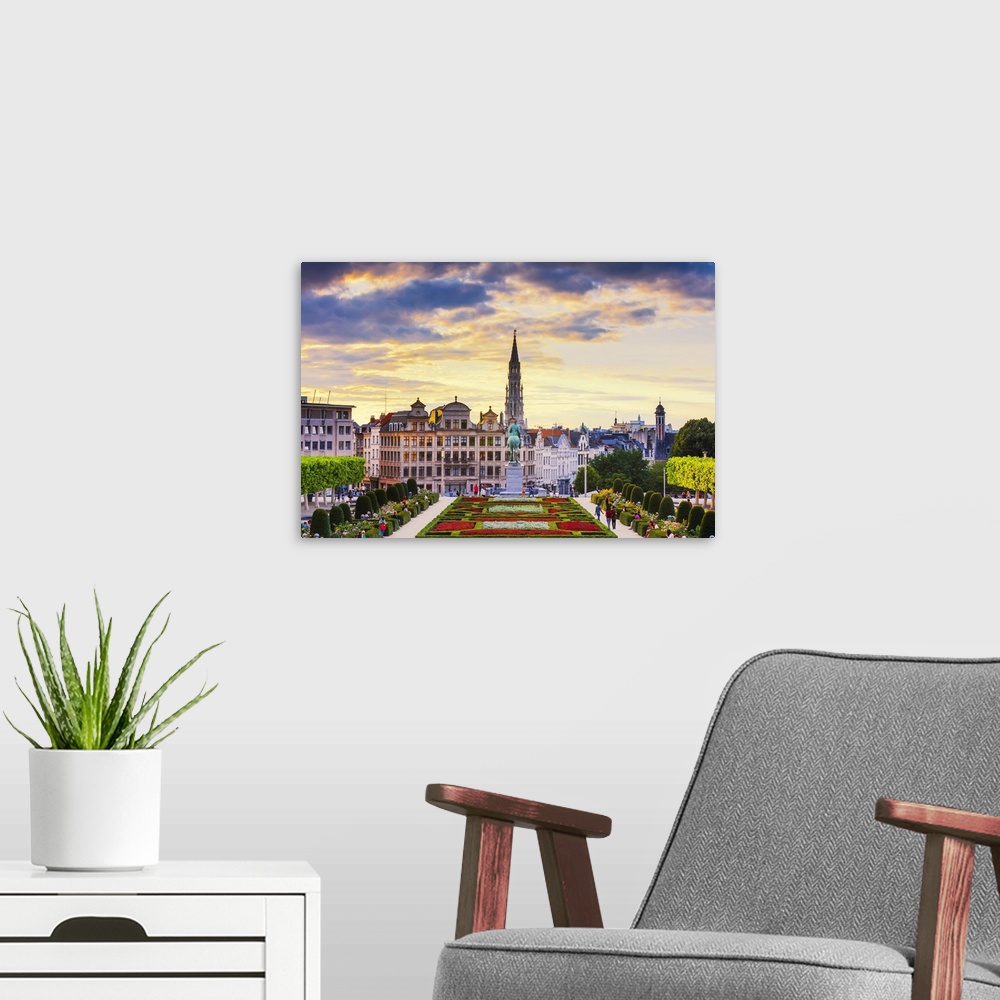 A modern room featuring View of the Brussels town hall and the Mont des Arts park at dusk, Belgium