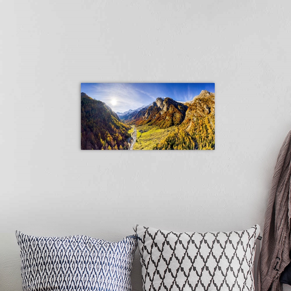 A bohemian room featuring Panoramic aerial view of Val Bodengo during autumn. Valchiavenna, Valtellina, Lombardy, Italy.