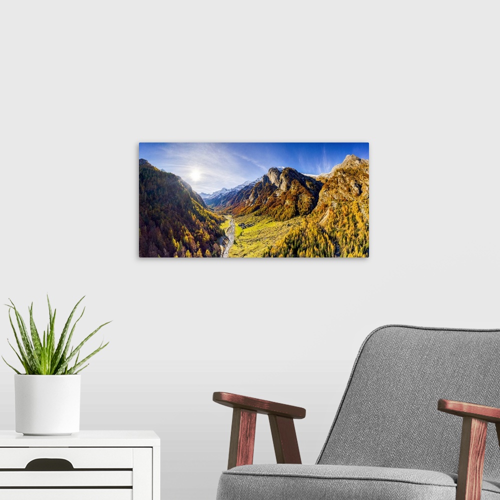 A modern room featuring Panoramic aerial view of Val Bodengo during autumn. Valchiavenna, Valtellina, Lombardy, Italy.