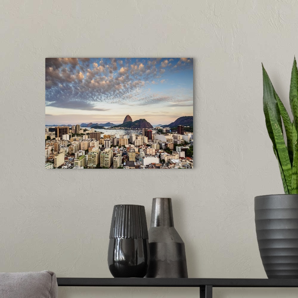 A modern room featuring View over Botafogo towards the Sugarloaf Mountain at sunset, Rio de Janeiro Brazil