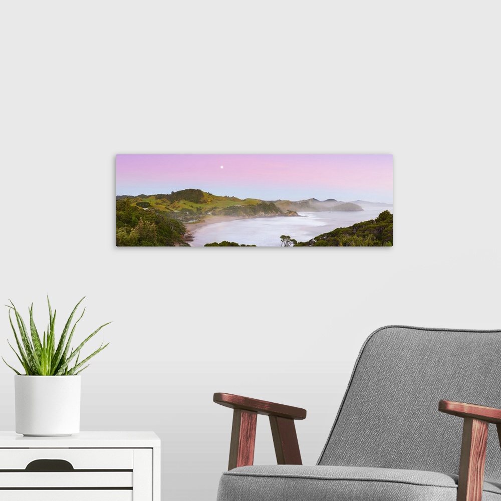 A modern room featuring Elevated View Over Sandy Bay illuminated at dawn, Tutukaka Coast, Northland, North Island, New Ze...