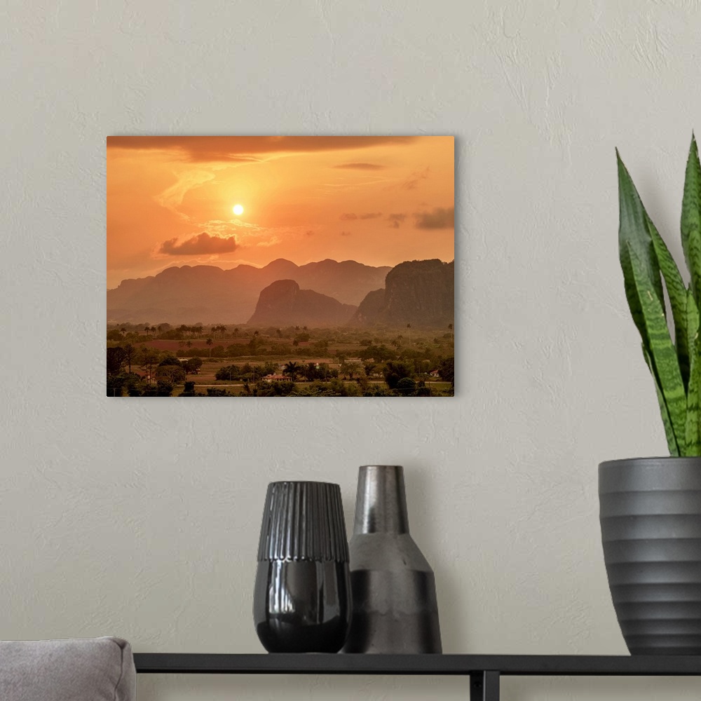 A modern room featuring Vinales Valley at sunset, elevated view, UNESCO World Heritage Site, Pinar del Rio Province, Cuba