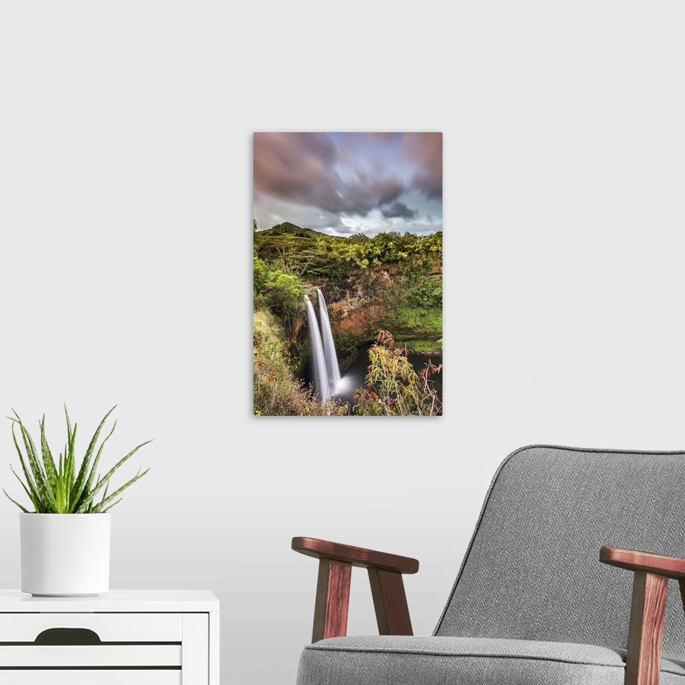 A modern room featuring Wailua waterfalls at sunset seen from the lookout, Hawaii, USA.