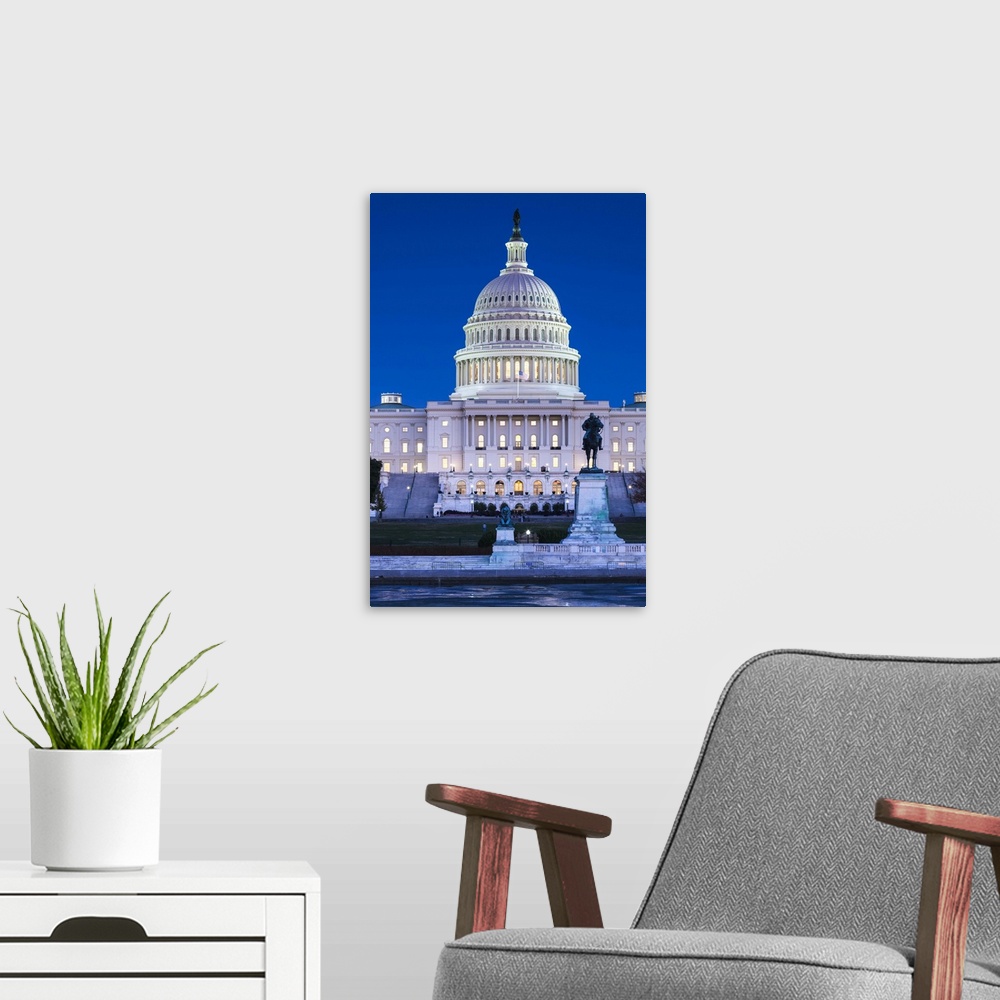 A modern room featuring USA, Washington DC, US Capitol, dusk