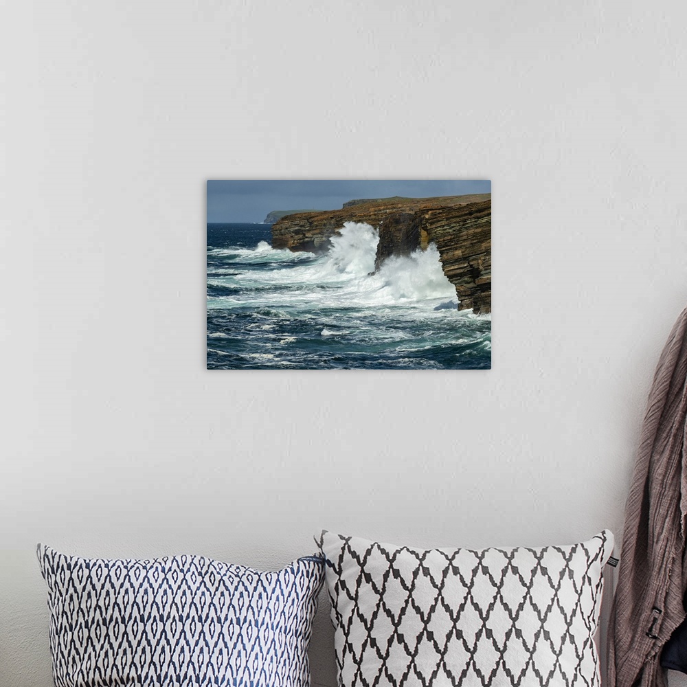 A bohemian room featuring Huge waves crash against the layered cliffs of Yesnaby on the wild west coast of Mainland, Orkney...