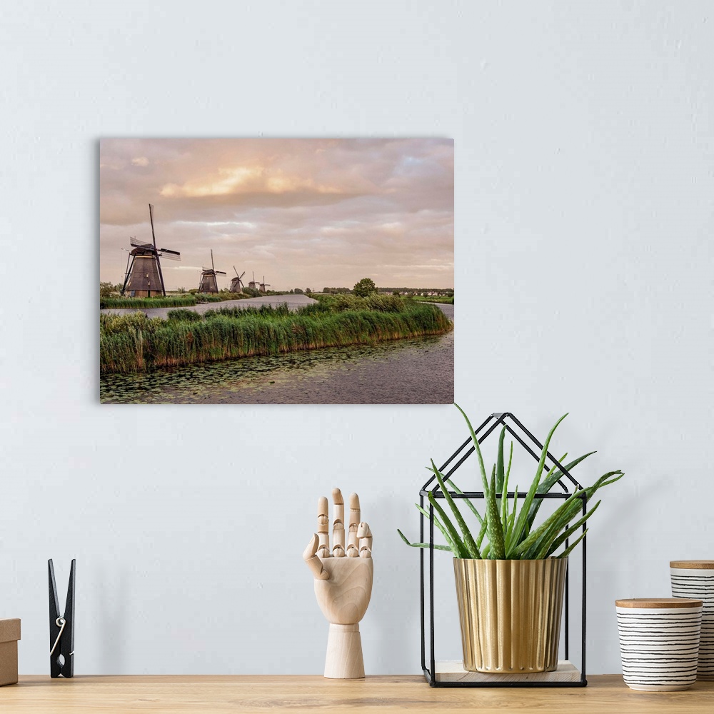 A bohemian room featuring Windmills In Kinderdijk At Sunset, UNESCO World Heritage Site, South Holland, The Netherlands