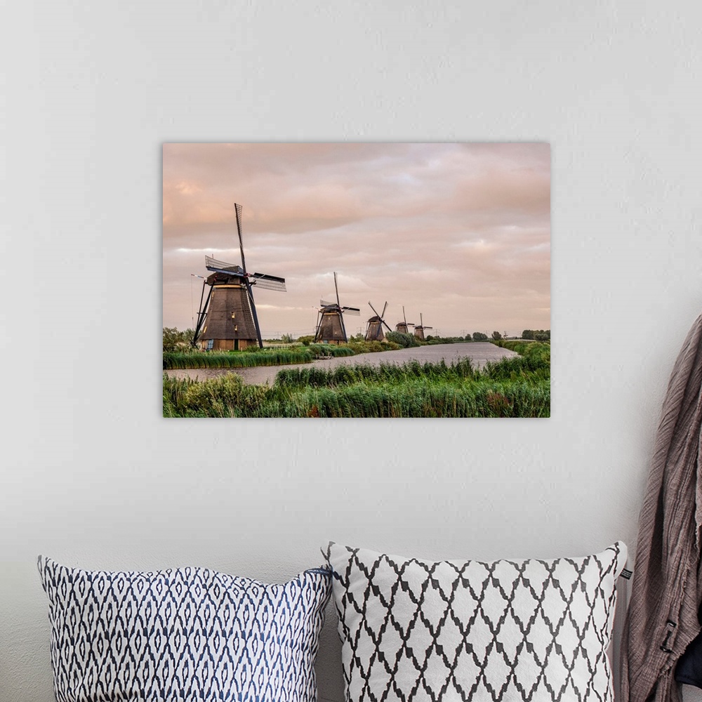 A bohemian room featuring Windmills In Kinderdijk At Sunset, UNESCO World Heritage Site, South Holland, The Netherlands