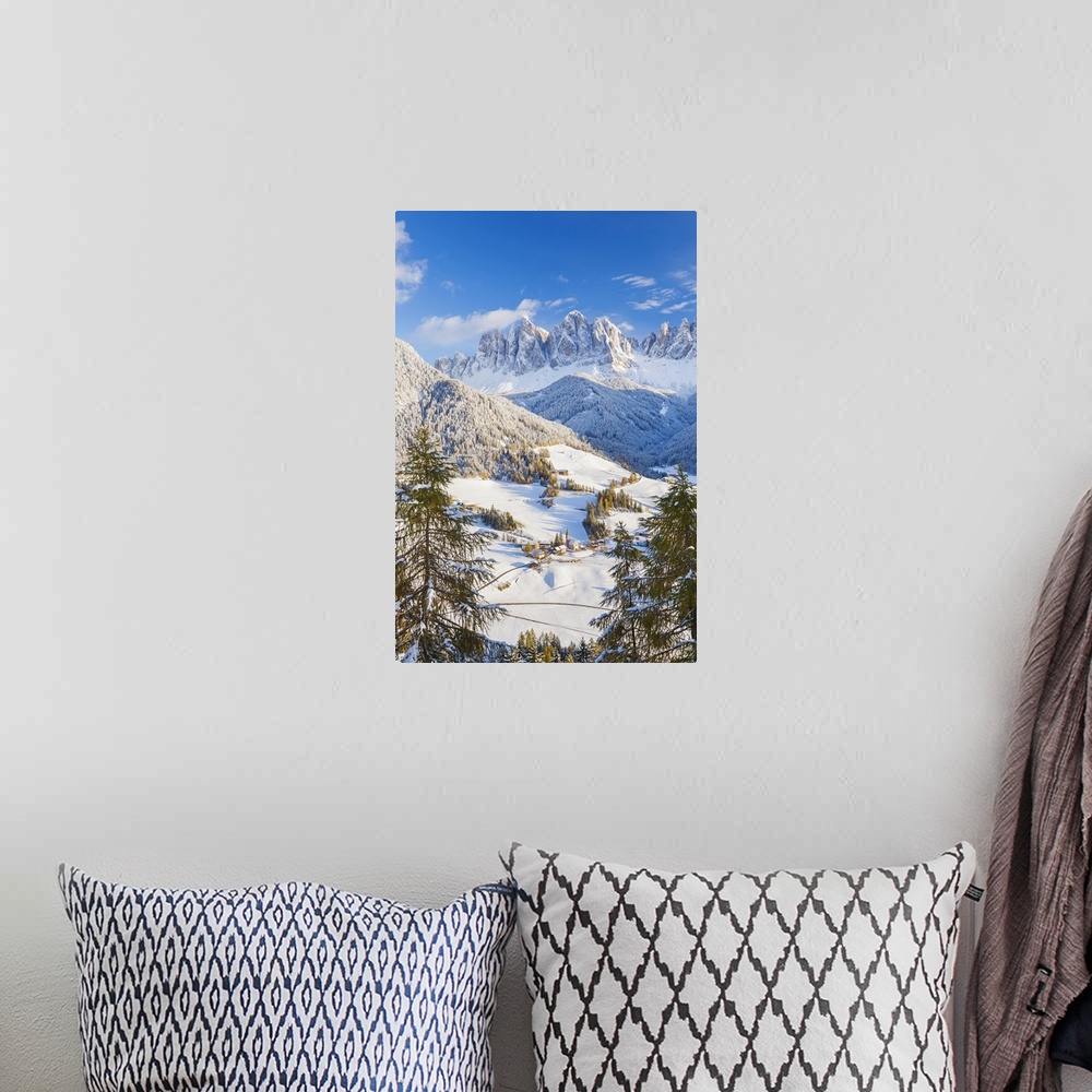 A bohemian room featuring Winter snow; St. Magdalena village; Geisler Spitzen (3060m); Val di Funes; Dolomites mountains; T...
