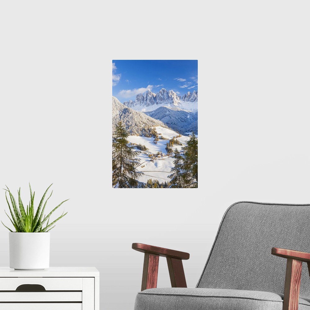 A modern room featuring Winter snow; St. Magdalena village; Geisler Spitzen (3060m); Val di Funes; Dolomites mountains; T...