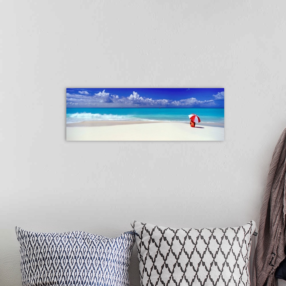 A bohemian room featuring Woman With Red And White Umbrella On Beach, Barbuda, Caribbean, West Indies