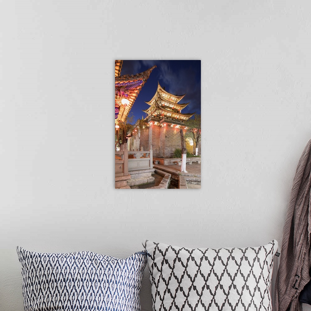 A bohemian room featuring Wu Hua Gate at dusk, Dali, Yunnan, China.