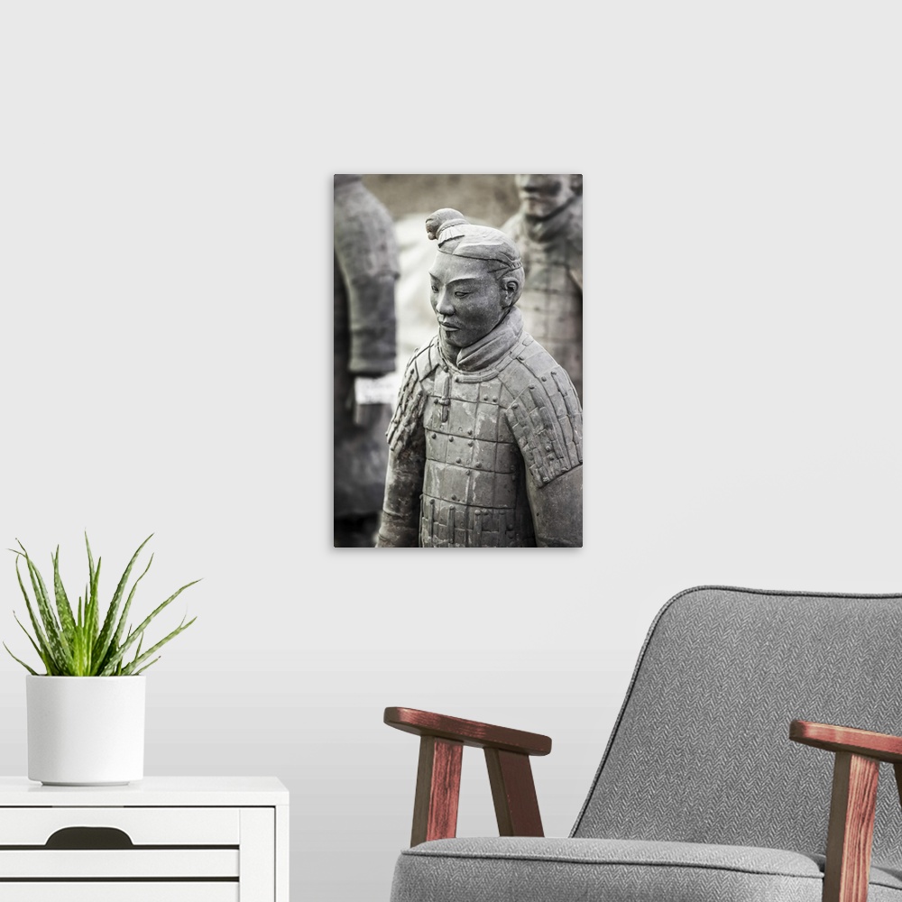 A modern room featuring Xian, Shaanxi, China. Close up of one of the many warriors of the terracotta army (majong)