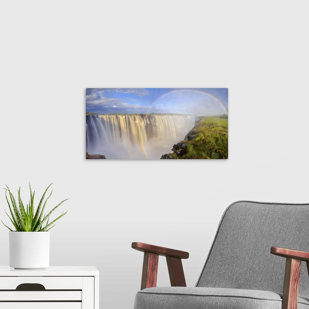 A modern room featuring Zimbabwe, Victoria Falls, Victoria Falls National Park during rainy season (UNESCO Site).